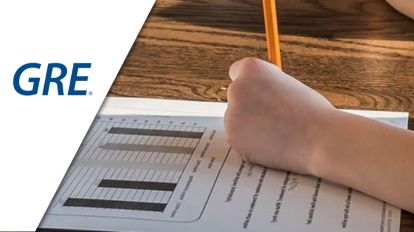 A person writing on a test
