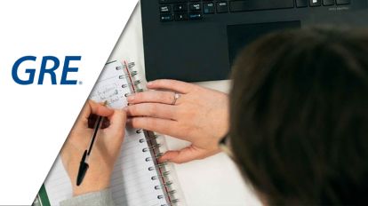 A woman writing on her notebook