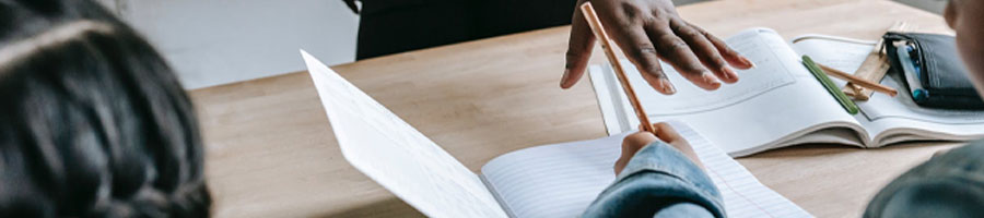 students writing in class