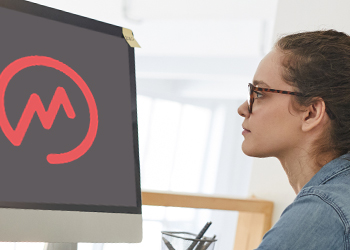 A woman looking at her screen