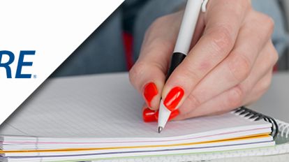 Woman writing on a notebook combined with GRE logo