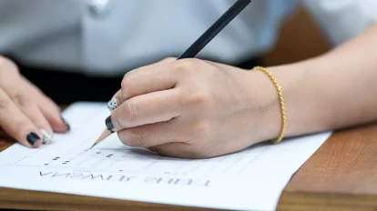 Student shading the answer sheet
