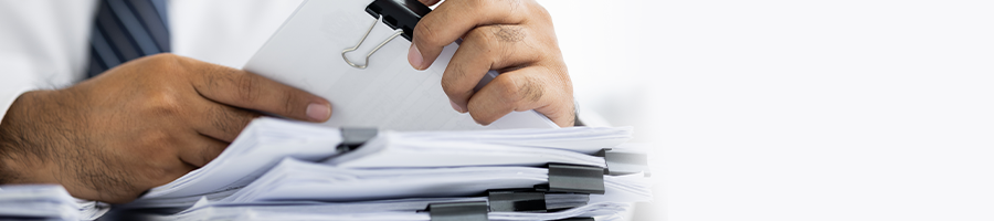 man arranging documents