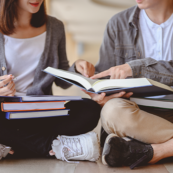 students studying beside each other